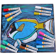 a group of markers on a piece of paper with text: 'BLAMi CHALK BLAMi CHALK CHALK CHALK BLAMi BLAMi CHALK CHALK BLAMi BLAMi CHAlk'